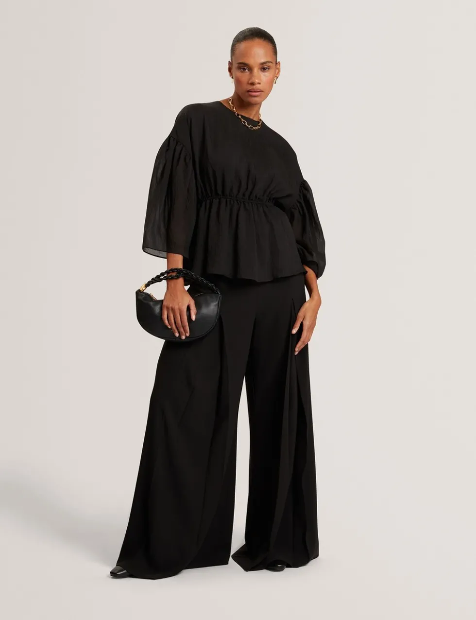 Lyocell Rich Puff Sleeve Peplum Top