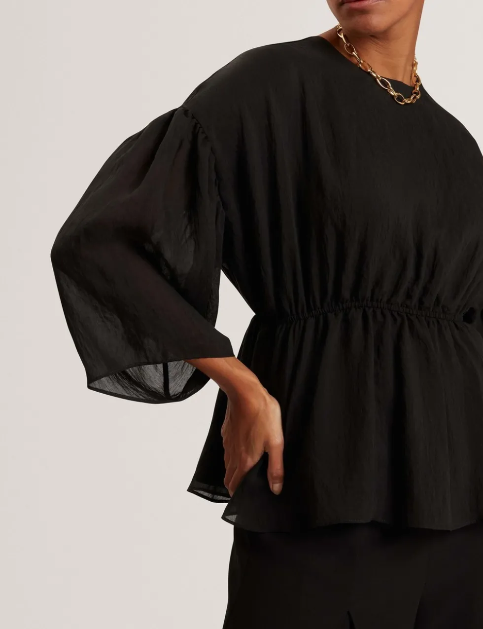 Lyocell Rich Puff Sleeve Peplum Top
