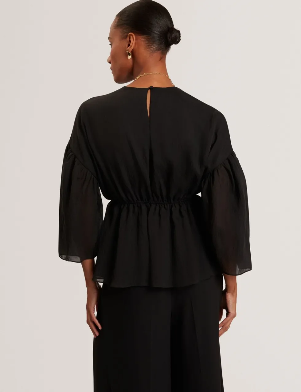 Lyocell Rich Puff Sleeve Peplum Top