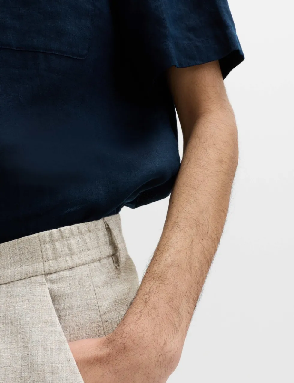 Relaxed Fit Textured Pleat Front Trousers