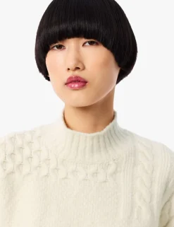 Wool Rich Cable Knit Roll Neck Jumper